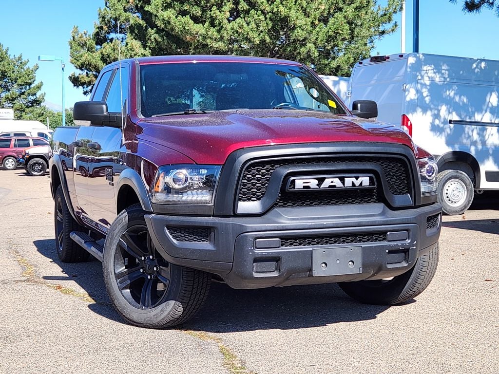 2022 RAM 1500 Classic Warlock Quad Cab 4x4 6'4' Box in Delmonico Red Pearlcoat — front three-quarter view