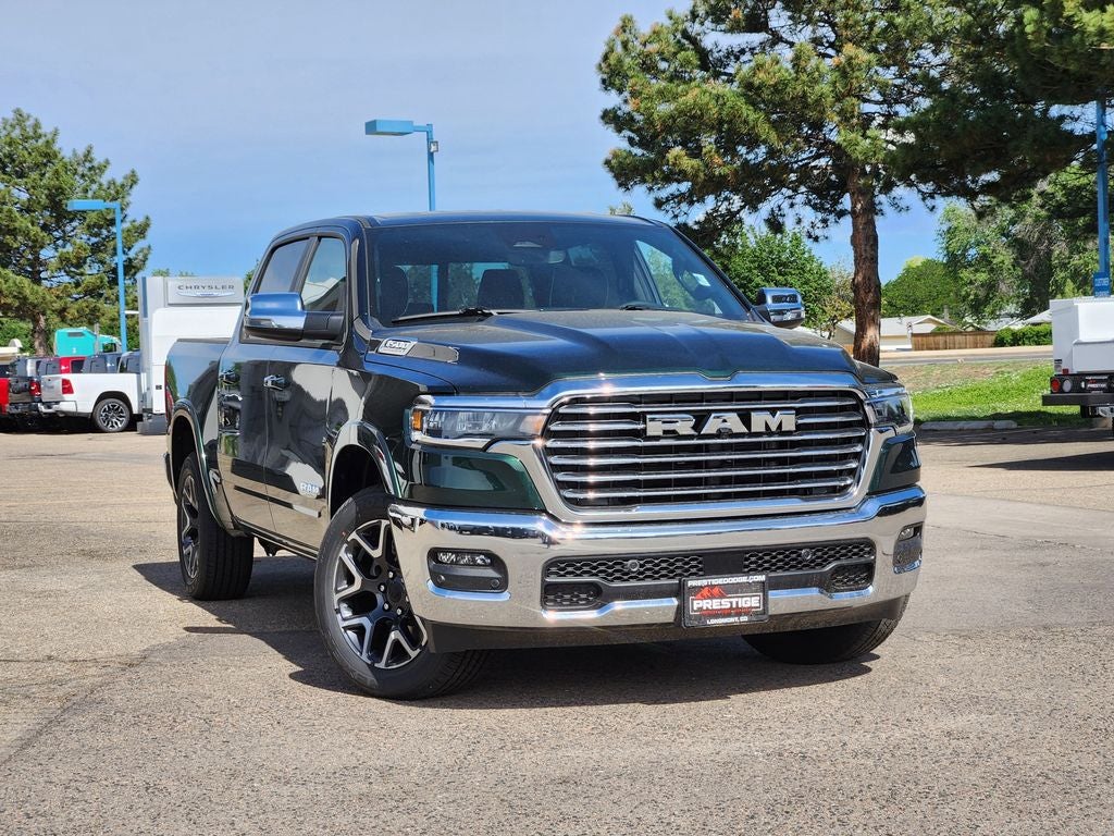 2026 RAM 1500 RAM 1500 LARAMIE CREW CAB 4X4 5'7' BOX in Serrano-Green Metallic Exterior Paint — front three-quarter view