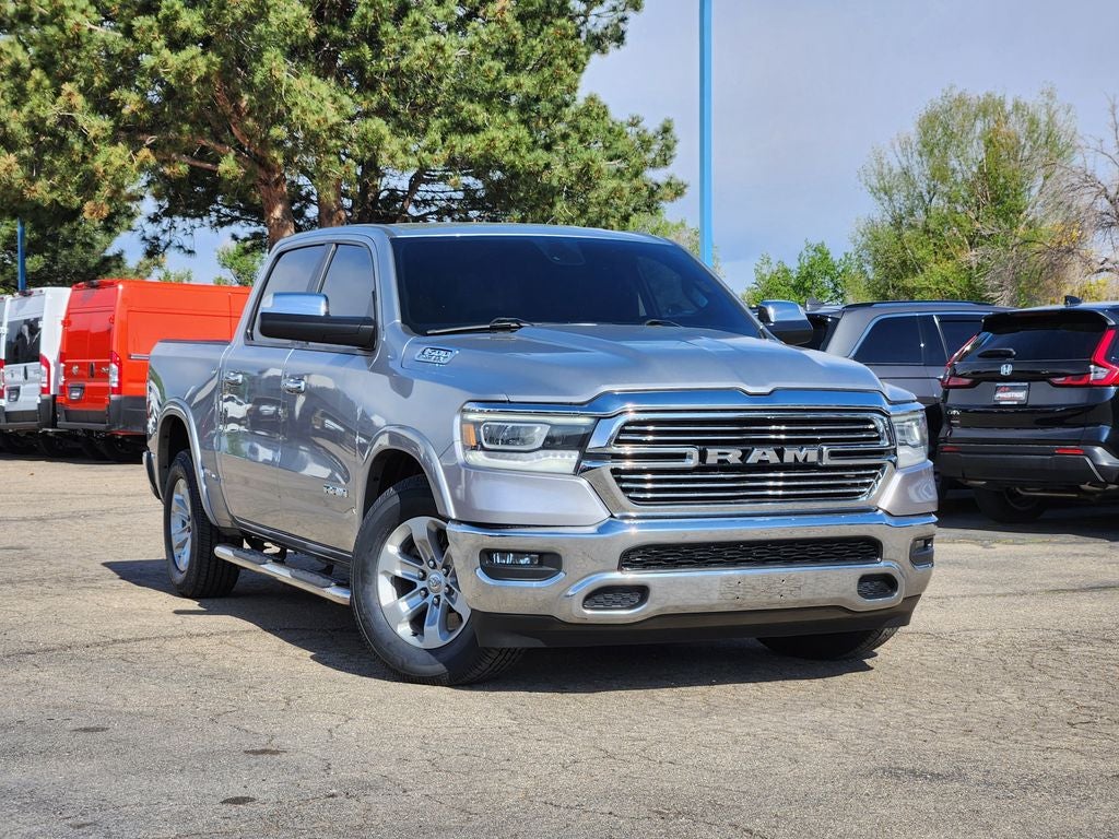 2019 RAM 1500 Laramie Crew Cab 4x4 5'7' Box in Billet Silver Metallic Clearcoat — front three-quarter view