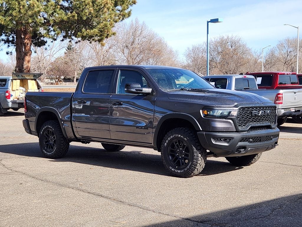 2026 RAM 1500 RAM 1500 REBEL CREW CAB 4X4 5'7' BOX in Granite Crystal Metallic Clear-Coat Exterior Paint — front three-quarter view