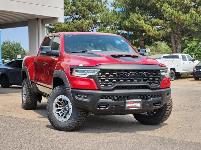 2026 RAM 1500 RAM 1500 RHO CREW CAB 4X4 5'7' BOX in Molten Red Pearl-Coat Exterior Paint — front three-quarter view