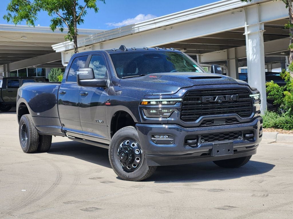 2026 RAM 3500 RAM 3500 LARAMIE CREW CAB 4X4 8' BOX in Forged Blue Metallic Exterior Paint — front three-quarter view