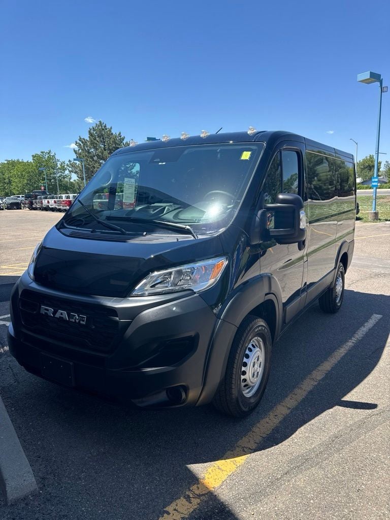 2026 RAM ProMaster 1500 Cargo Van Tradesman Low Roof 118' WB w/Pass Seat in Black Clearcoat — front three-quarter view