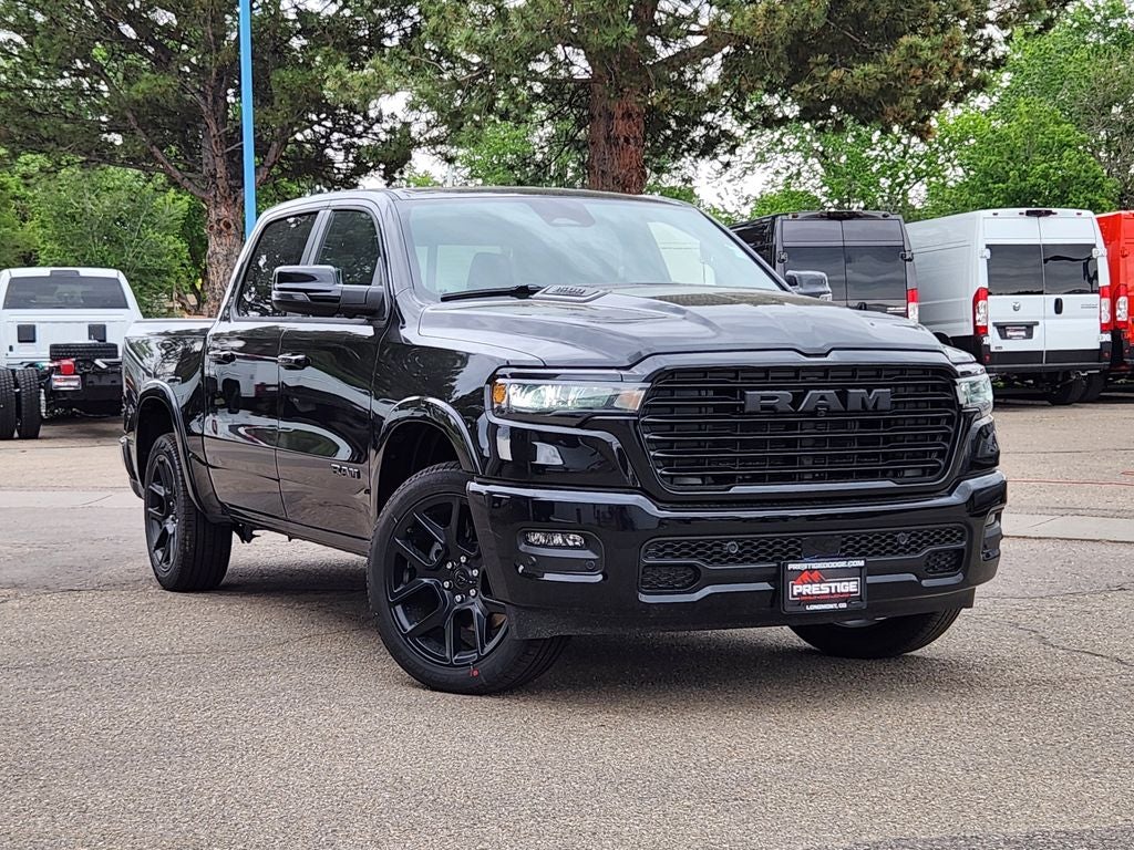 2026 RAM 1500 RAM 1500 LARAMIE CREW CAB 4X4 5'7' BOX in Diamond Black Crystal Pearl-Coat Exterior Paint — front three-quarter view