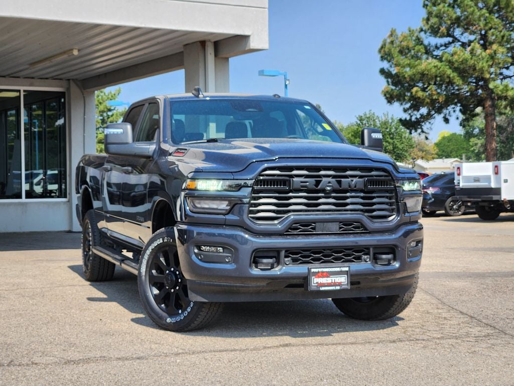 2025 RAM 2500 Big Horn Crew Cab 4x4 6'4' Box in Forged Blue Metallic — front three-quarter view