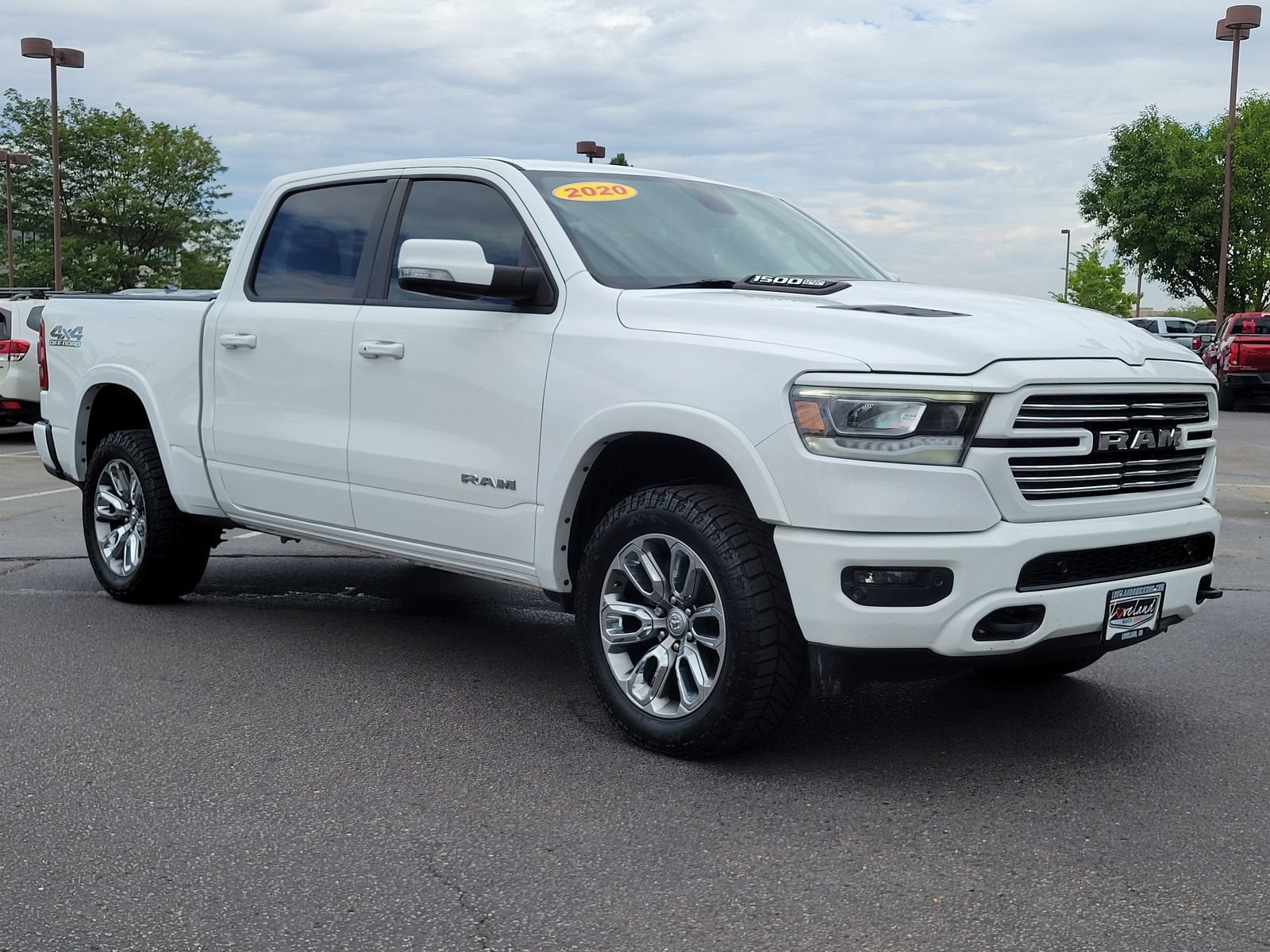 2020 RAM 1500 Laramie in White — front three-quarter view