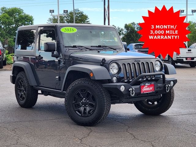 2016 Jeep Wrangler Willys Wheeler in Rhino Clearcoat — front three-quarter view