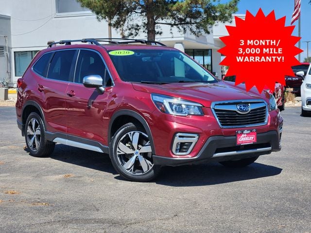 2020 Subaru Forester Touring in Crimson Red Pearl — front three-quarter view