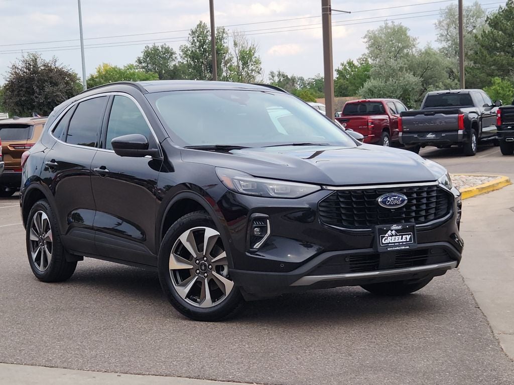 2023 Ford Escape Platinum in Agate Black Metallic — front three-quarter view