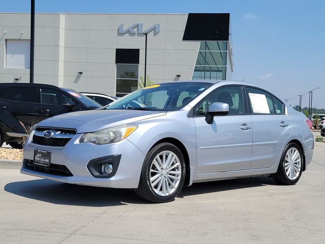 2012 Subaru Impreza 2.0i Limited in Ice Silver Metallic — front three-quarter view